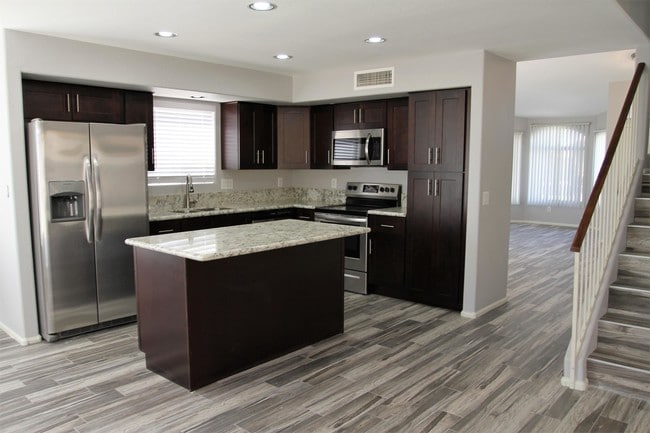 Building Photo - 12409 W San Juan Ave