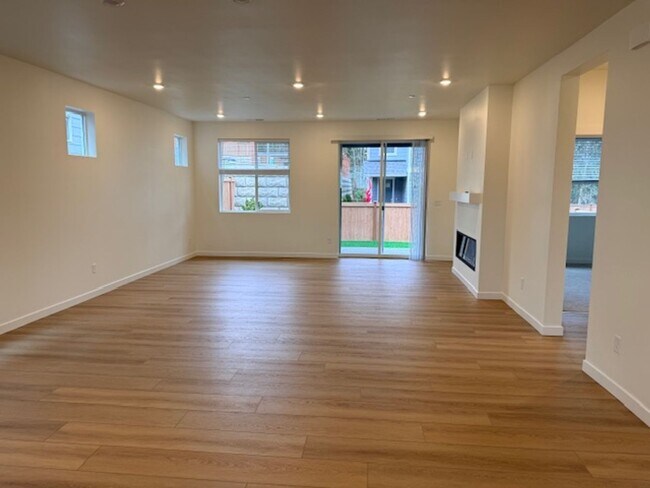 Building Photo - Elegant 4-Bed, 4-Bath 3-Story Home with Gourmet Kitchen & Private Backyard