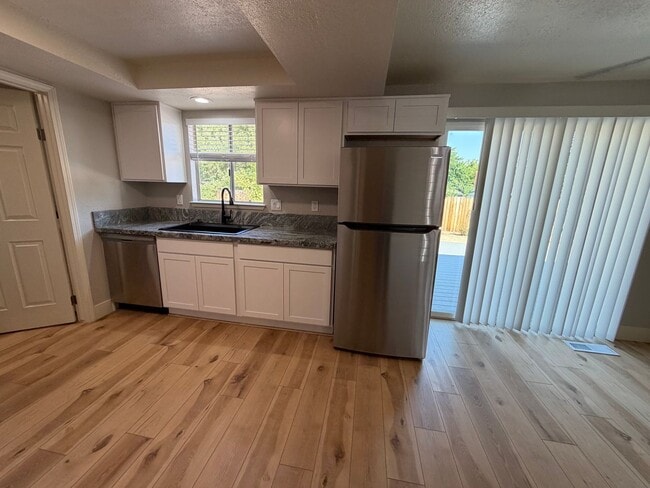 Building Photo - Modern Comfort Meets Stylish Living in This Updated Sparks Home!