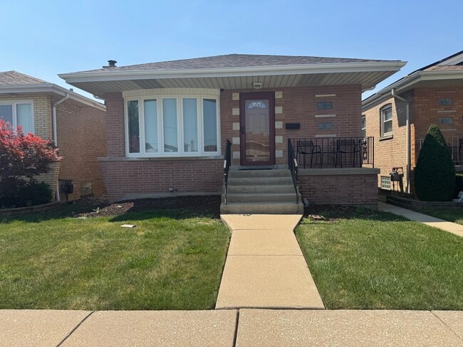 Building Photo - 6525 W 63rd Pl