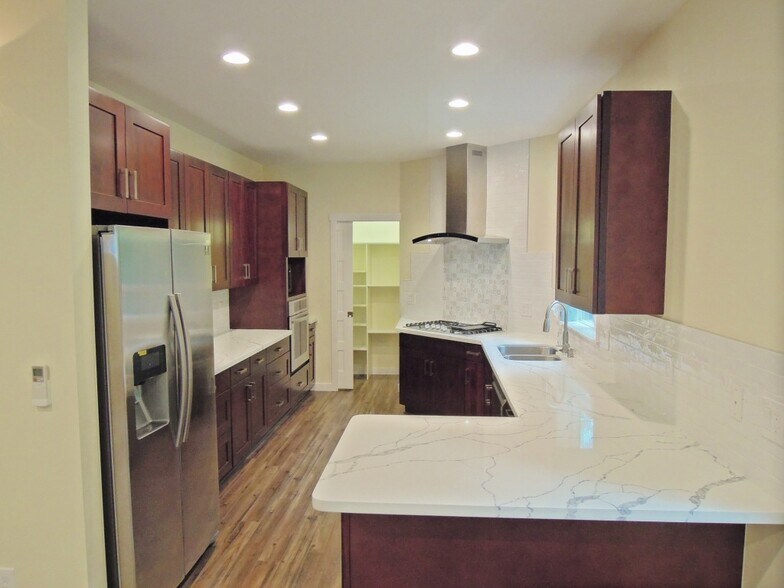 Large gourmet kitchen - 321 3rd Pl NW