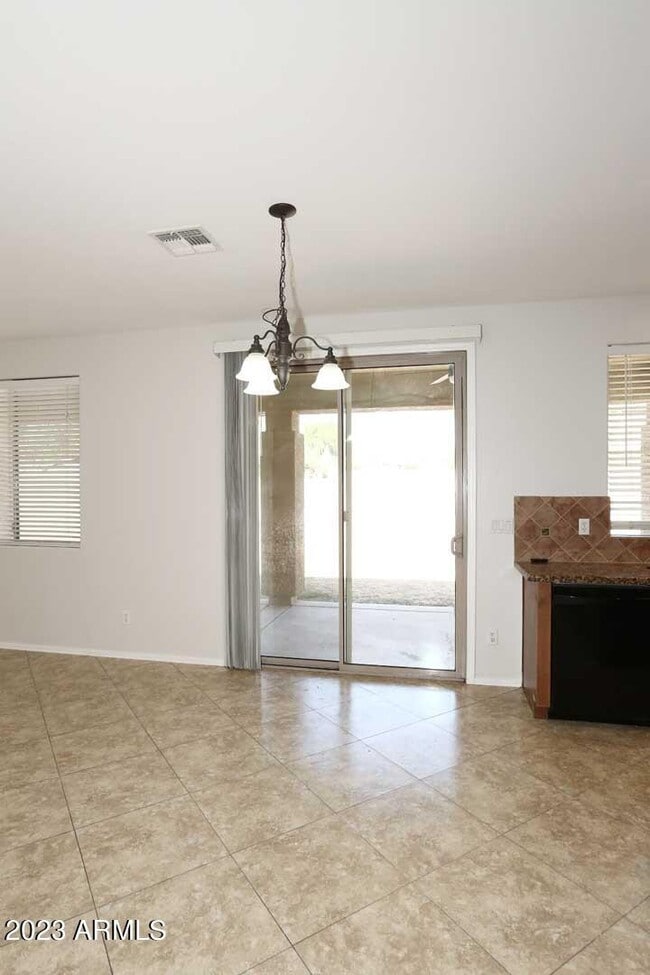 Building Photo - 7062 W Andrew Ln