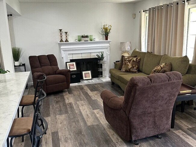 Building Photo - This beautifully remodeled 3-bedroom, 2-bathroom home is designed with an open concept layout