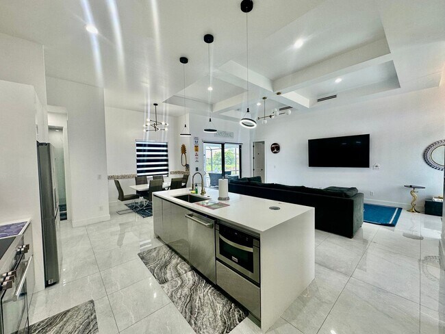 Building Photo - Fully Furnished Annual Rental- 3 Bedroom 2 Bathroom - Pool and Waterfront- NE CAPE CORAL