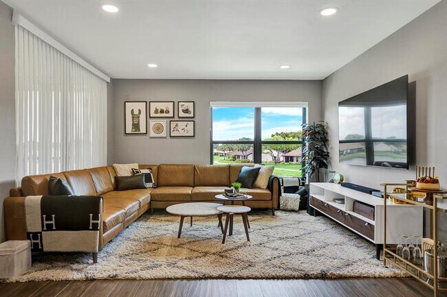 Building Photo - 8665 Boca Glades Blvd W