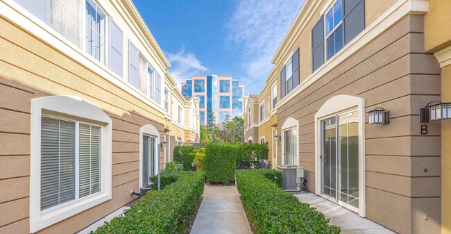 Building Photo - Stunning Upgraded Tri-Level Condo in South Coast Metro’s Exclusive Vantage Community