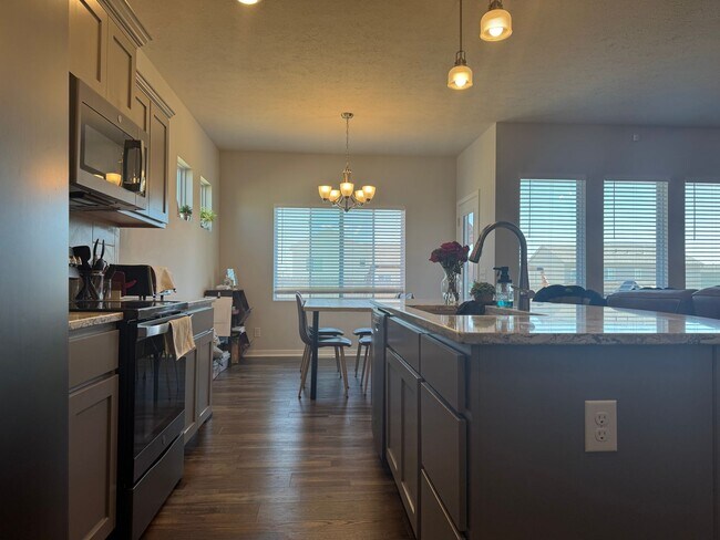 Building Photo - Spacious 4-Bedroom Ranch with Finished Basement & 3-Car Garage