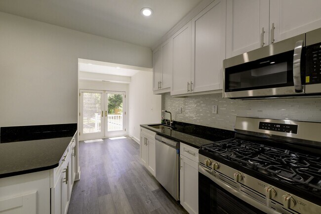 Building Photo - Charming & Renovated Petworth Rowhouse with Parking -  Available Now!
