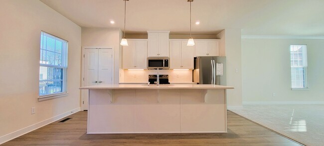 Building Photo - Brand new 3 story Townhome in Centerpointe...