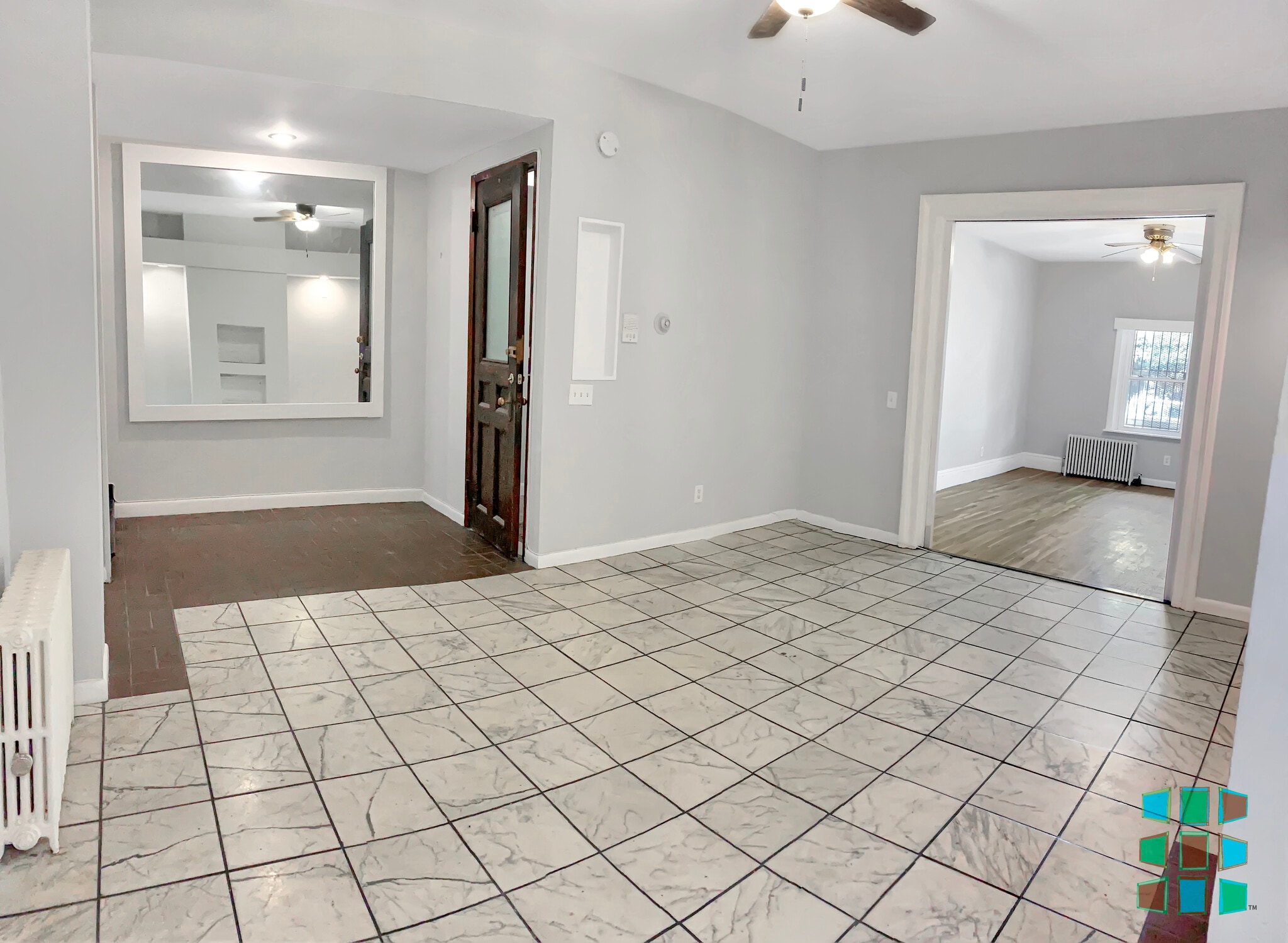 Living/Dining area with bedroom pocket doors open - 131 Hall Street