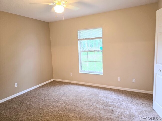 Building Photo - 9676 N Jourden Dr