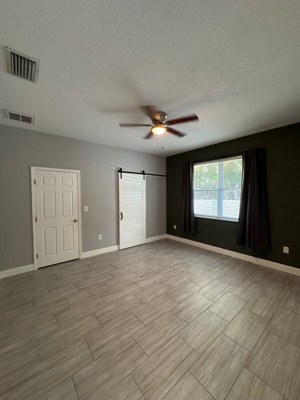 Building Photo - 6412 S Adelia Ave