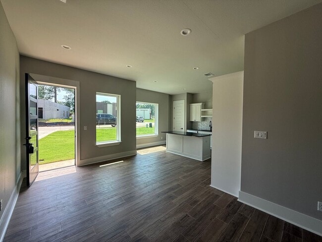 Building Photo - 3/2/1 NEW CONSTRUCTION LISD fenced yard an...