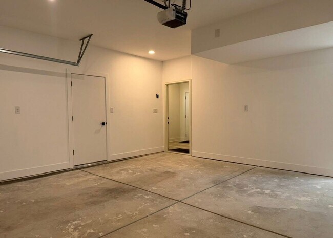 Building Photo - Vaulted Ceilings & Hardwood Floors in This Charming Indianapolis L