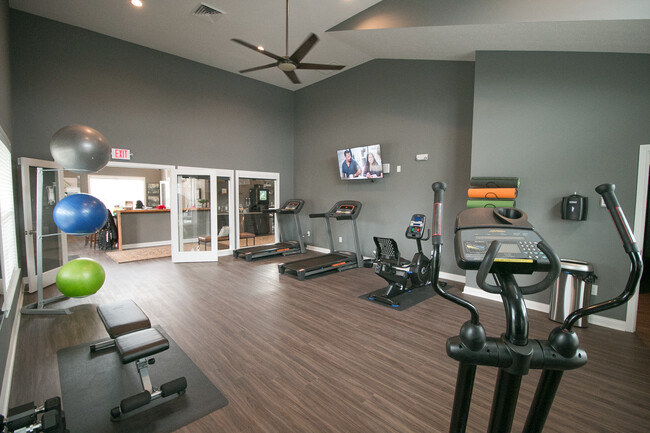 24-hour fitness center - The Residences at Woodside