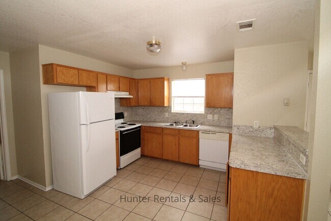 Building Photo - 4504 Jeff Scott Dr
