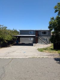 Building Photo - **Spacious 4-Bedroom, 2-Bath Residence with Waterfront & Hillside Views – Vallejo**