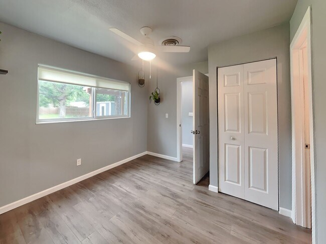 Building Photo - Front Porch Charm & Backyard Dreams!