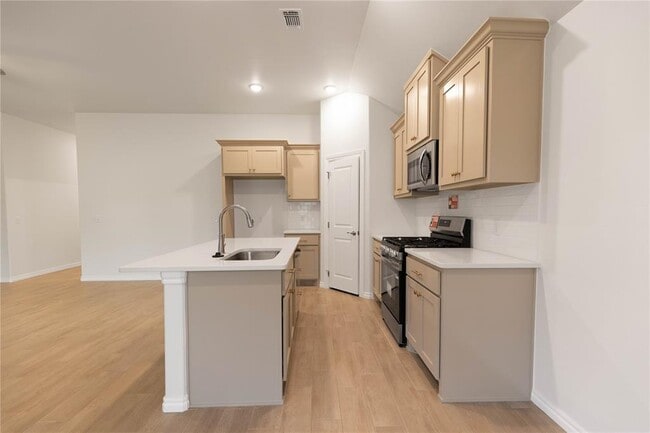 Building Photo - 8708 Poppey Pl