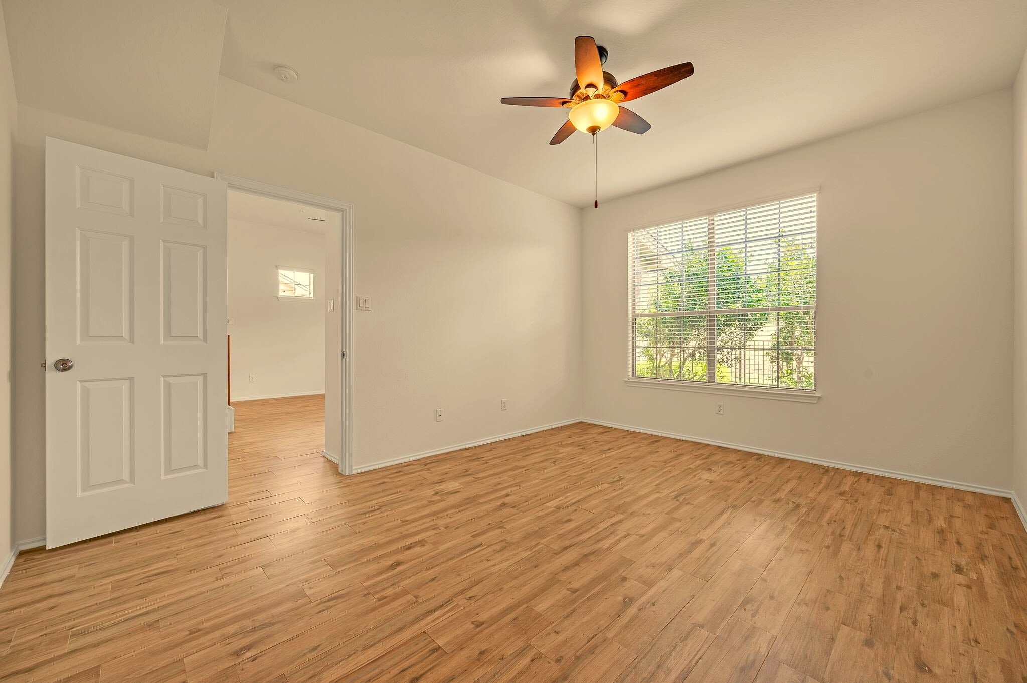 Master bedroom and door to living room - 9201 Brodie Ln