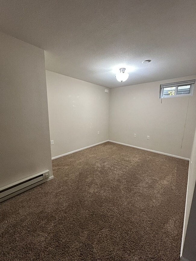 Building Photo - Spacious 5-Bedroom Family Haven with Moder...
