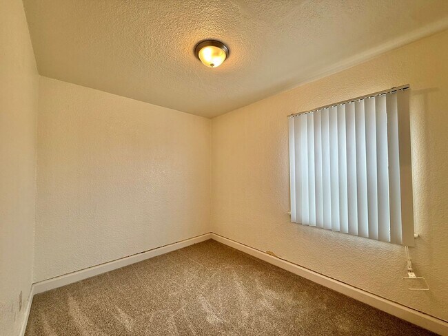 Building Photo - 2 Bedroom Home nestled in City Heights! With Parking!!