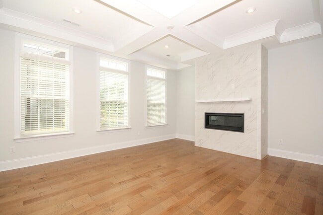 Building Photo - Beautiful John Wieland end unit townhouse ...
