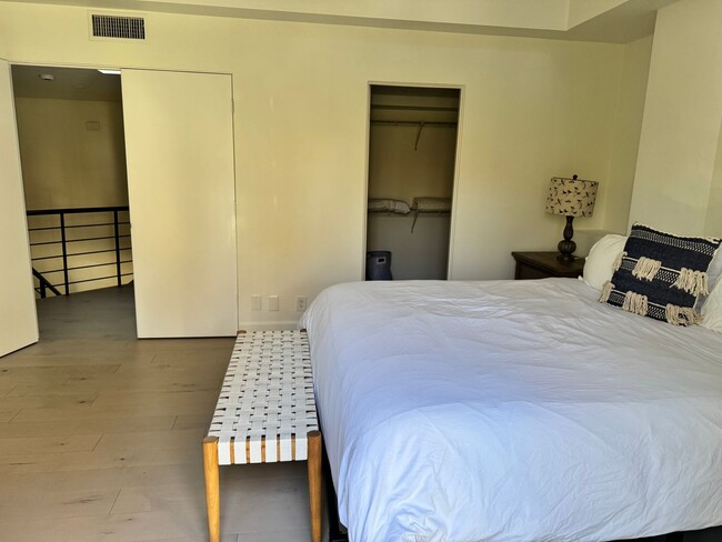 Building Photo - Charming Furnished Condo with Two Patios! ...