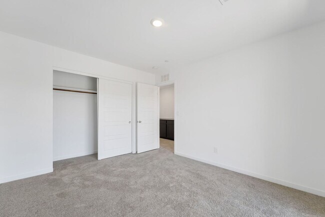 Building Photo - Modern Cadence Townhome with Sleek Finishes & Open-Concept Living!