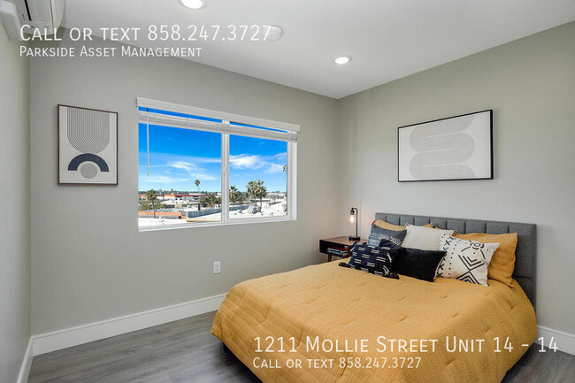 Building Photo - $1,000 Move-in Credit! The Carl on Lauretta