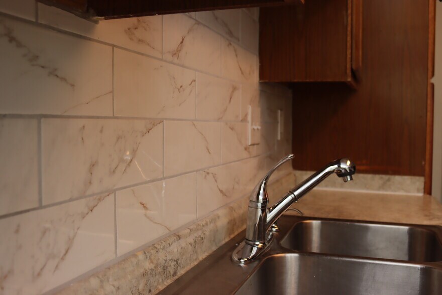 Sink and New Backsplash ( May 2020 ) 3 - 1057 Stones Throw Dr NW