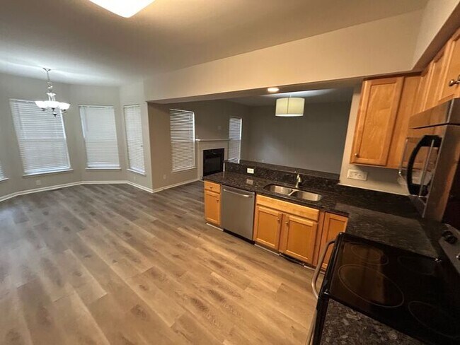 Building Photo - **Spacious 4-Bedroom Home with Walk-In Clo...