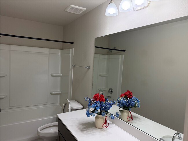 Building Photo - 8711 Windsong Trail Dr