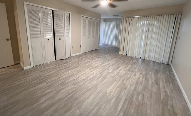 Building Photo - Two-story condominium, featuring 2 bedrooms and 2 1/2 bathrooms