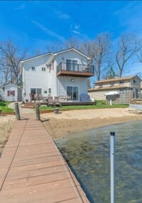 Building Photo - "Lakefront Living! Modern 3BR/2BA Home with Water Views & Private Dock