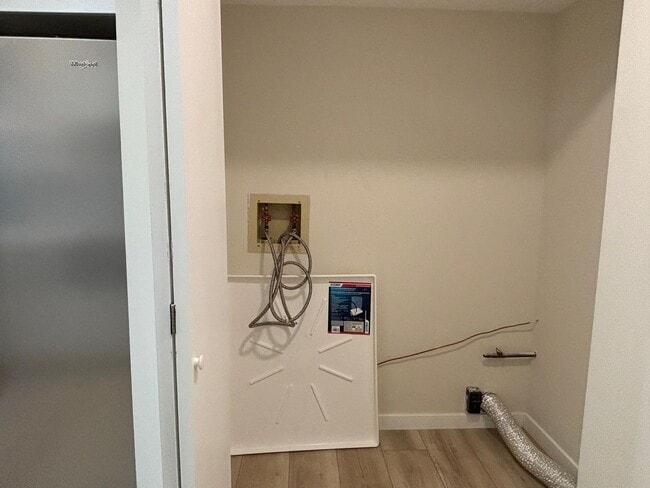 Building Photo - Charming Condo in a Can't-Miss Location – Private Deck, Garage, and Nature-Filled Community