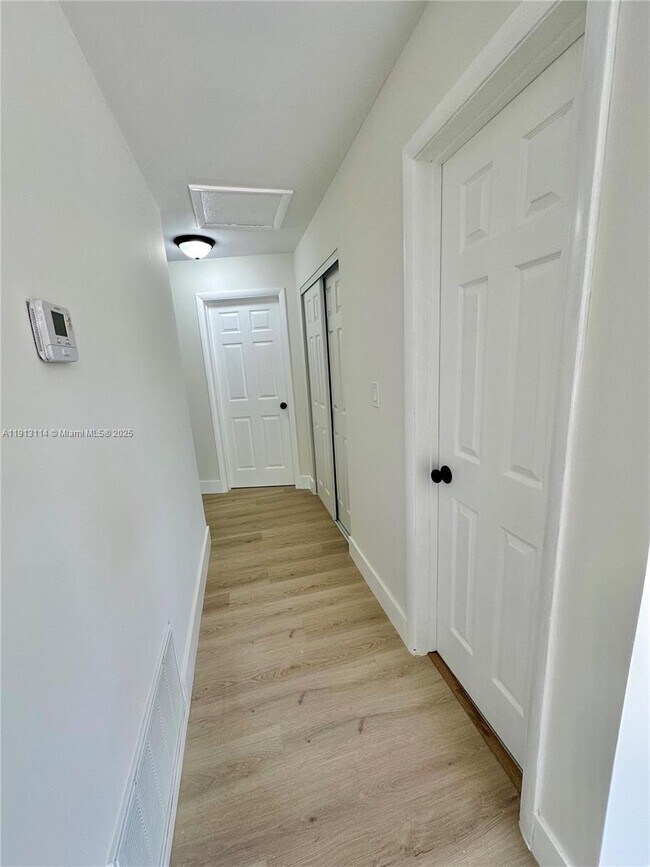 Building Photo - 6570 NW 6th Ct