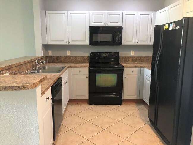 Building Photo - 8209 SW 25th Ct