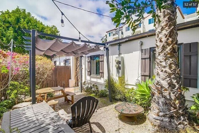 Building Photo - Charming, Fully Furnished Spanish-Style Du...