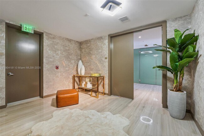 Building Photo - 18975 Collins Ave