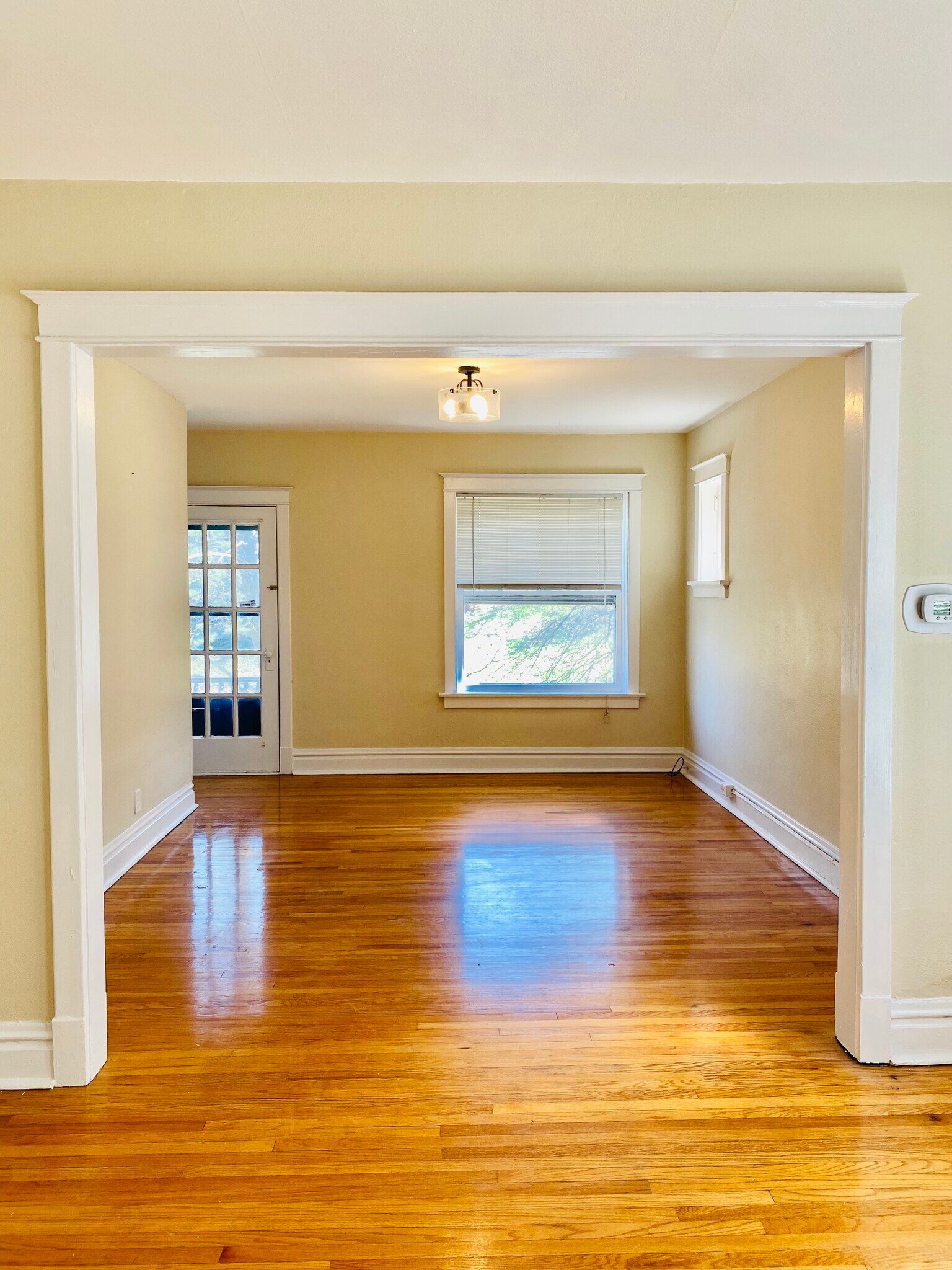Living Room and door to the balcony - 2127 Alfred Ave