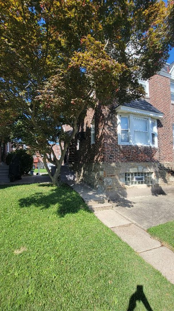 Building Photo - 7703 Woolston Ave