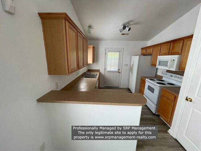 Building Photo - Great Three Bedroom Ranch with Fenced Yard...