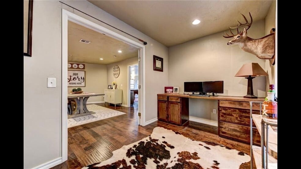 Full office space with build in desk, french doors for privacy and noice control. Perfect for anyone working from home. - 2056 NW 48th St