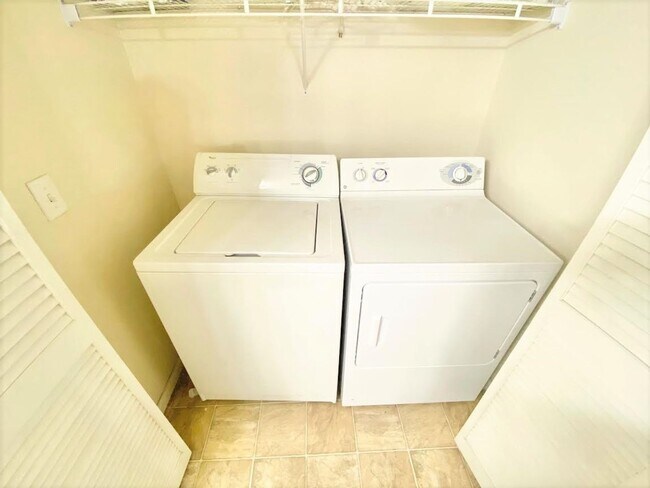 Building Photo - COZY ONE BEDROOM CONDO IN GUARD GATED COMM...