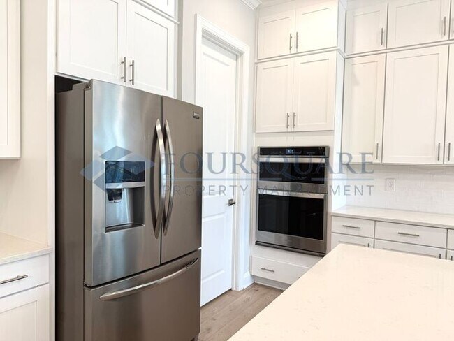 Building Photo - Elegant 4-Bed / 3.5-Bath Home with Main-Level Primary Suite, Quartz Kitchen & 3-Car Garage – In H...