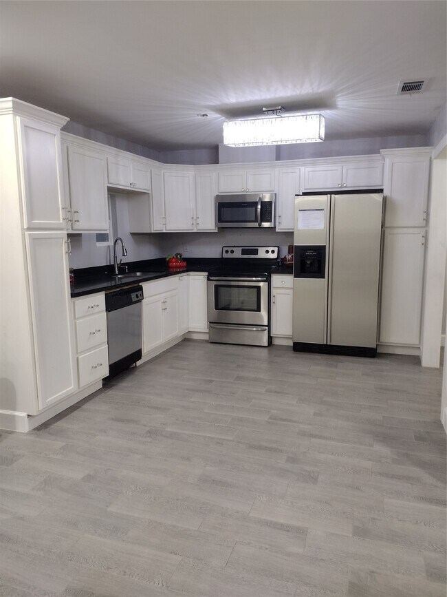 Building Photo - 7514 Wovenwood Ln