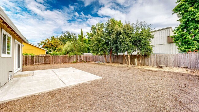 Building Photo - Bright 2 Bedroom, 1 Bathroom Single Family Home! Attached 2 Car Garage and Landscaping Included!