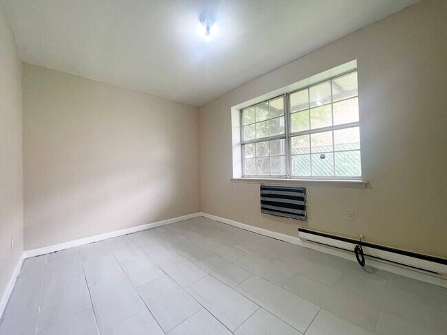 Building Photo - 213-49 38th Ave