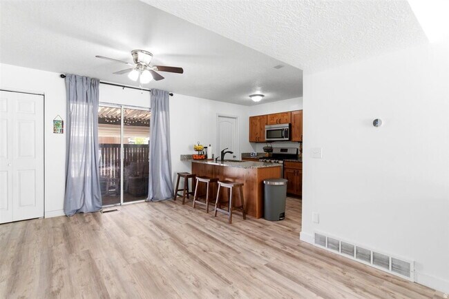 Building Photo - "Spacious 3-Bed Oasis with Fireplace & Modern Vinyl Touches in Ogden"